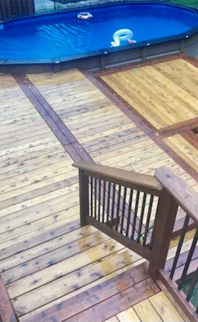 deck builder thornnhill: a wooden deck with a railing connected to pool